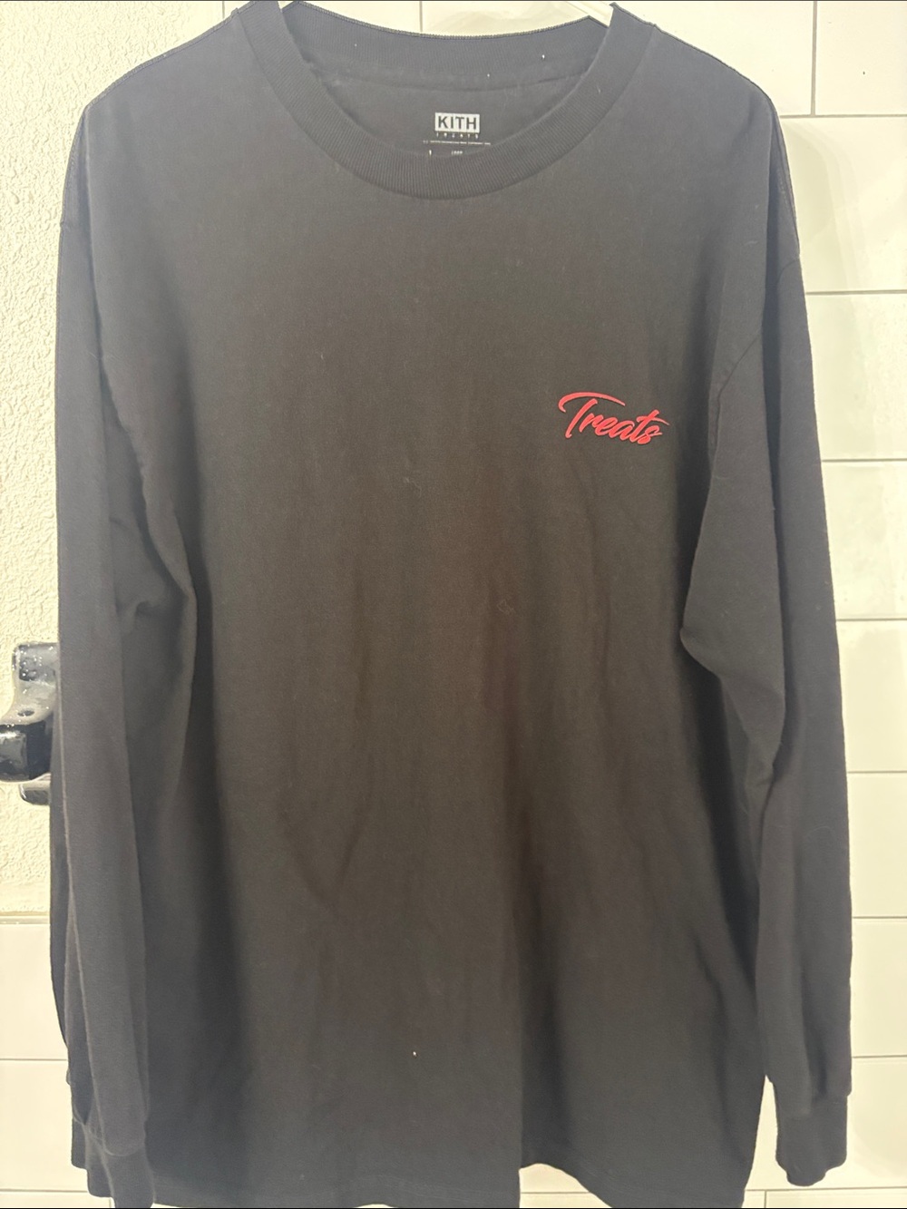 Kith Black Long-Sleeve Tee with Red ‘Treats’ Chest Logo